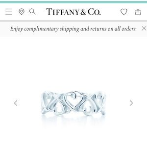 Tiffany & Co “Loving Heart Band Ring”.